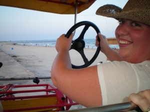 Liz gets a souvenir steering wheel 